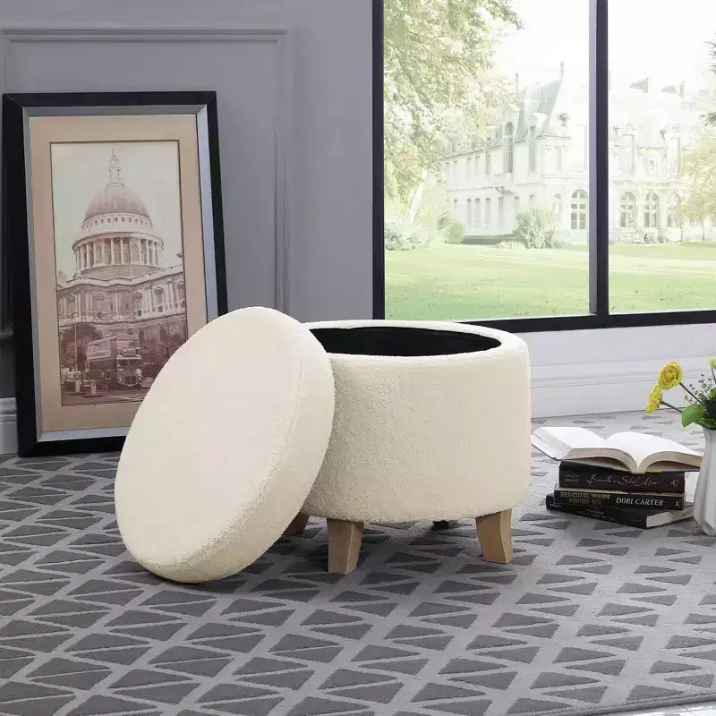 Pouf rotondo contenitore da 48 cm con coperchio rimovibile, gambe svasate in legno sbiancato, capacità 113 kg