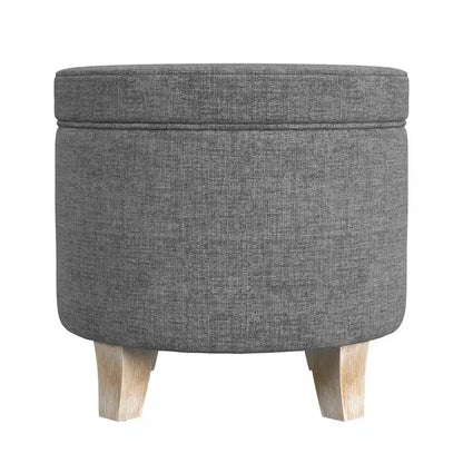 Pouf rotondo contenitore da 48 cm con coperchio rimovibile, gambe svasate in legno sbiancato, capacità 113 kg