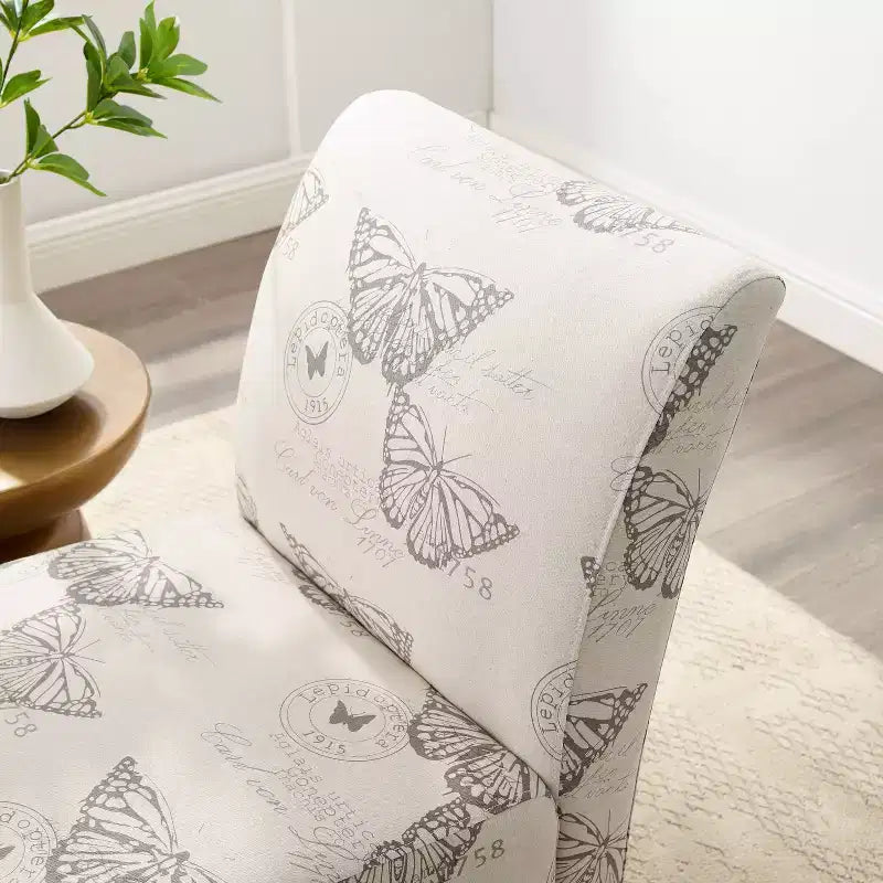 Poltroncina d'appoggio imbottita con stampa a farfalla in lino, gambe in legno di gomma, capacità 125 kg